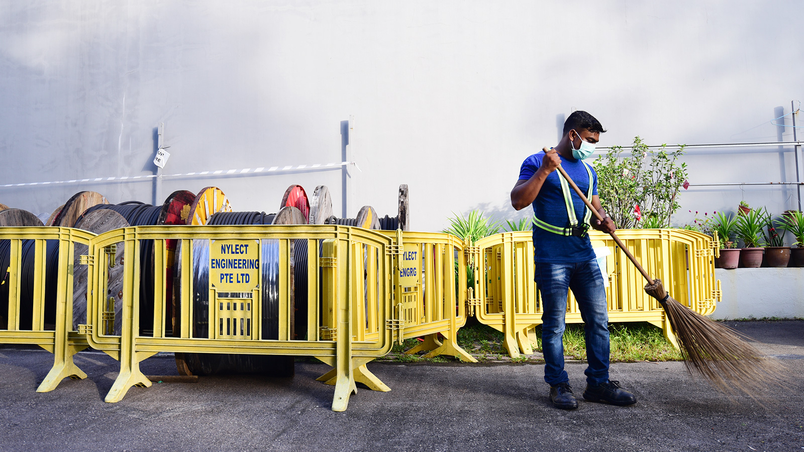 A staff of Nylect Engineering is cleaning and disinfecting the factory compound more frequently than before. 