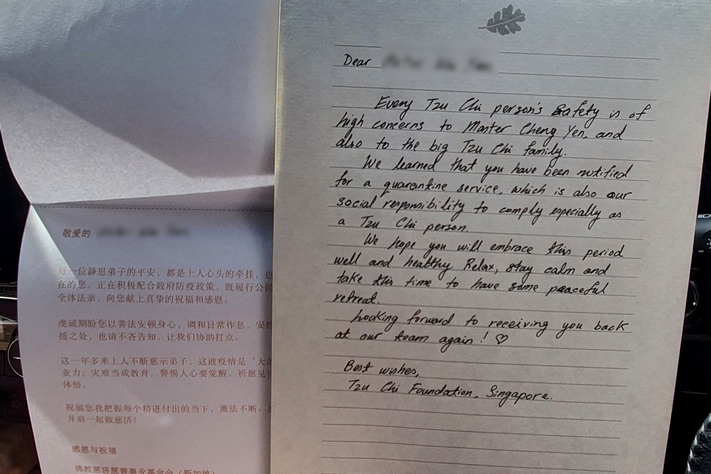 Personal hand-written notes from Tzu Chi were also included in the care packages.  (Photo by Susan Tan)